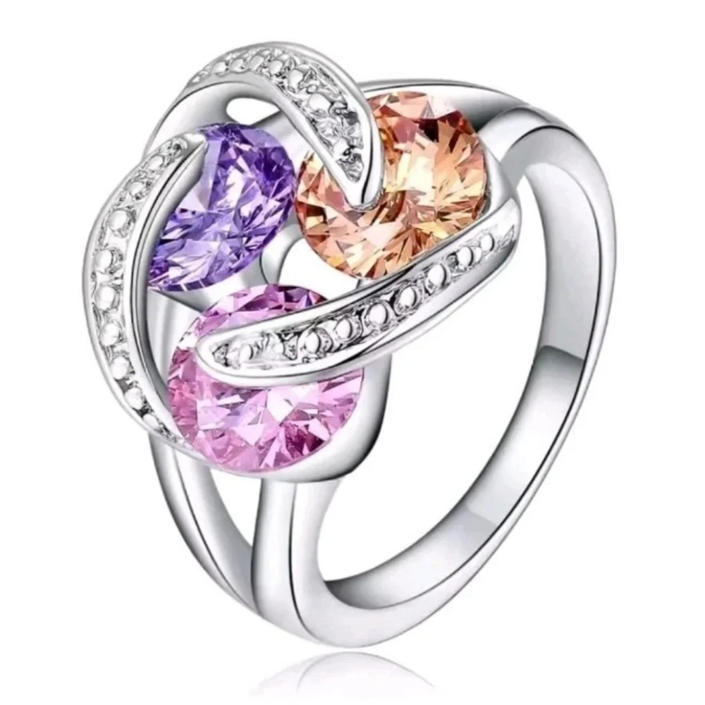 Sparkling Zirconia With Pink,yellow, and Purple Rotating Gemstone Design Sz 8